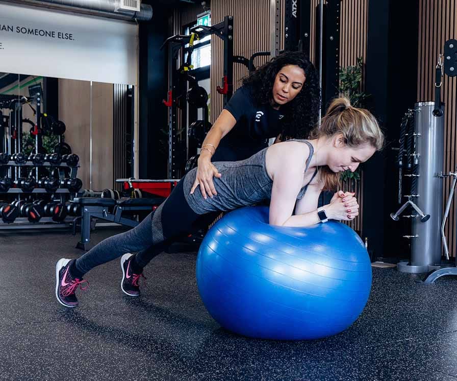 free trial lesson lady on an exercise ball